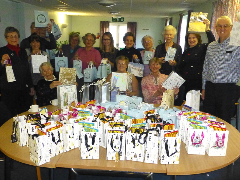 A team of volunteers assembled nearly 700 gift bags for in-patients over the Christmas period.